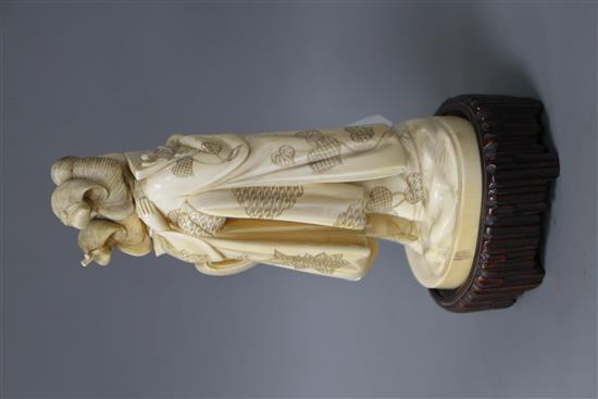 A Japanese Tokyo School carved ivory group of two geisha, late Meiji period, signed, height 18cm, overall height 21cm